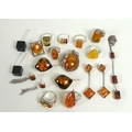 A collection of amber and amber coloured jewellery, all set in white metal or silver, some pieces ma... 
