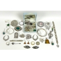 A group of silver and plated jewellery, including a silver christening bangle and larger bangle, rec... 