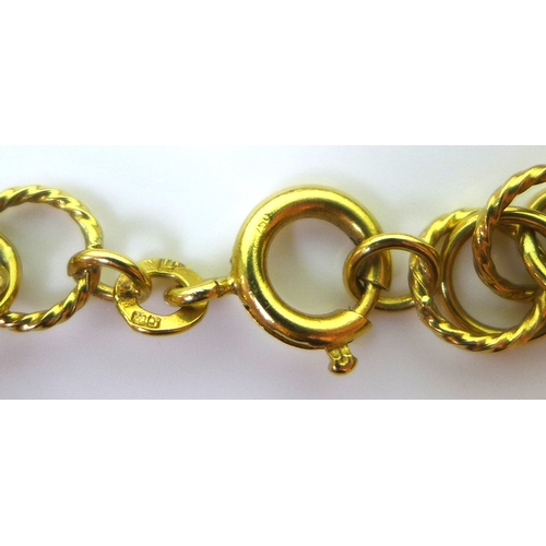 260 - A Kutchinsky 18ct gold chain link necklace, formed of interconnected plain and fine rope twist rings... 