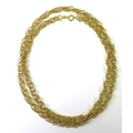 A Kutchinsky 18ct gold chain link necklace, formed of interconnected plain and fine rope twist rings... 