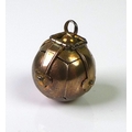 A Masonic orb pendant, the exterior and hinged clasps covered in 9ct gold, opening into a cross form... 