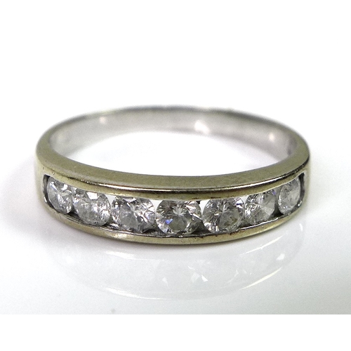 224 - An 18ct white gold half eternity diamond ring, set with seven diamonds, approx 0.5ct total diamond w... 