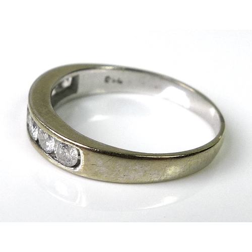 224 - An 18ct white gold half eternity diamond ring, set with seven diamonds, approx 0.5ct total diamond w... 