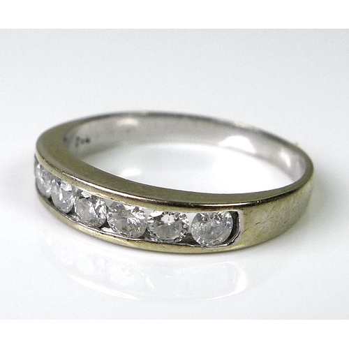 224 - An 18ct white gold half eternity diamond ring, set with seven diamonds, approx 0.5ct total diamond w... 