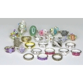 A group of silver dress rings, including an example set with a large green oval cabochon, a marcasit... 