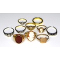 A group of ten gold, yellow and white metal rings, comprising a 22ct yellow gold wedding band, size ... 