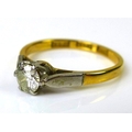 An 18ct gold and platinum diamond solitaire ring, approx 0.25ct diamond, platinum stylised leaf shou... 
