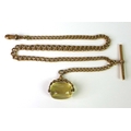 A 9ct gold graduated Albert fob chain, with 9ct gold T bar attached, spring clip and swivel fob, 42c... 