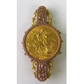 A George V gold sovereign, 1914, in 9ct gold brooch mount, 11.4g total.