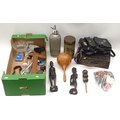 A group of vintage collectables, including two African carved figures, two seed shakers, a wicker ba... 