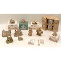 A group of Lilliput Lane sculptures, four with boxes, two Hummel figurines, two Hummel mugs and a sp... 