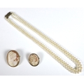 A double strand of Mikimoto cultured pearls, on 9ct gold engraved clasp, the pearls graduated from 7... 