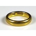 A 22ct yellow gold wedding band, size M, 9.3g.