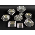 A collection of silver, including a silver collared decanter, the glass body and matching stopper fo... 
