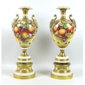 A pair of large modern Royal Worcester pedestal vases, foliate clasped twin handles, decorated with ... 