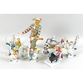 A collection of modern Meissen figurines, comprising Harlequin, 64564, 18cm, and a twelve piece ‘Clo... 