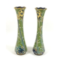 A pair of Moorcroft Macintyre 'Green and Gold' pattern Florian ware vases, early 20th century, the b... 