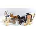 A collection of 20th century ceramic figures including a Lladro model of a clown and girl with two p... 