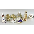 A group of Royal Crown Derby paperweights, including Meerkat MMVII, boxed, Wolf MMV, boxed, Cottage ... 