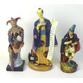 A Royal Doulton figurine, Ko Ko HN2898, together with two further Royal Doulton figurines, Pied Pipe... 