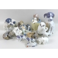 A group of modern Royal Copenhagen figurines, all of animals including eight of puppies, an owl, a g... 