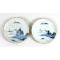 A pair of Chinese Qing Dynasty, 19th century, Imari dishes, of scalloped form, decorated in undergla... 