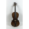 A late 19th century German violin, bearing label for 'Joseph Garnerius', back 35.5cm, 59.5cm overall... 