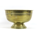 A Chinese polished bronze 'singing' bowl, Qing Dynasty, 18th / 19th century, with turned and flatten... 