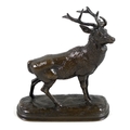 After Antoine Louis Barye (French, 1796-1875): a bronze sculpture modelled as a stag, on oval natura... 
