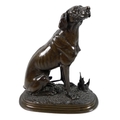 After Ferdinand Pautrot (French, 1832-1874): a bronze sculpture, modelled as a hunting dog in seated... 