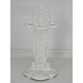 A Victorian cast iron umbrella stand, painted white, foliate and floral cast decoration with rosette... 
