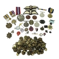 A collection of WWI and WWII badges and dog tags including British War medal and Victory medal both ... 