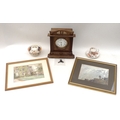 An early 20th century mantle clock, an unusual Art Deco style photograph frame, the two bevelled and... 