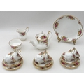 A Royal Albert Old Country Roses part tea set, comprising teapot, milk jug, sugar bowl, cake plate, ... 