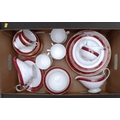 A modern Spode eight person dinner service in Bordeaux pattern, including plates, cups saucers, bowl... 