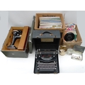A collection of items including a Singer sewing machine, a Smiths typewriter, a selection of vinyl r... 