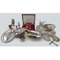 A collection of silver plated and metal items, including flatware, an oval tray, salad servers, spir... 