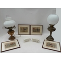 Two Victorian oil lamps, one converted to electricity, together with four hinting prints and two Bes... 