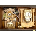 A group of mantel clocks, including a Smiths brass lantern style clock with quartz movement, a small... 