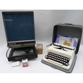 A Remington typewriter, together with a Micron 770 microfiche viewer. (2)