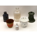 A selection of items including a late 19th century navy tin tea caddy, a 20th century porcelain opiu... 
