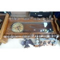 A mahogany cased Vienna wall clock, eagle surmount, twin train movement, with pendulum, 125cm.