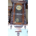 A mahogany cased Vienna wall clock, horse surmount, brass embossed dial, twin train movement, with p... 