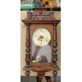 A mahogany cased Vienna wall clock, horse surmount, cream dial with Arabic numerals, with pendulum, ... 