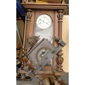 A mahogany cased Vienna wall clock, eagle surmount, half moon arch to dial painted with a dog, with ... 