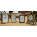A group of four carriage clocks, one with mount marked ACC, one with oval case marked St James, a Ba... 