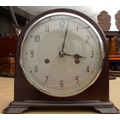 A mid 20th century Enfield mantel clock in domed Bakelite case, with silvered dial and Arabic numera... 