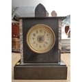 A slate mantel clock, cream dial with Arabic numerals, 29cm high.