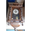 A mahogany cased Vienna wall clock, horse surmount, with pendulum, 62cm.
