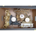 A group of three French 19th century gilt metal mantel clocks, one on alabaster base, each with smal... 